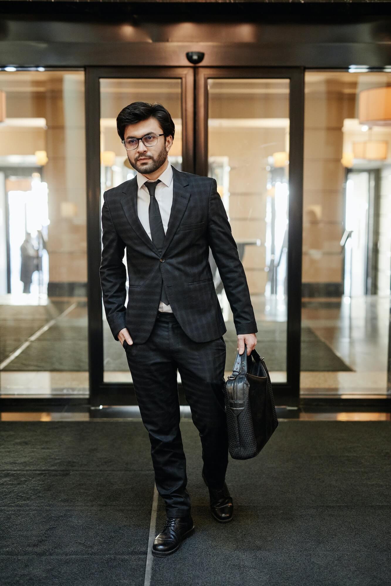 businessman-entering-hotel-1.jpg
